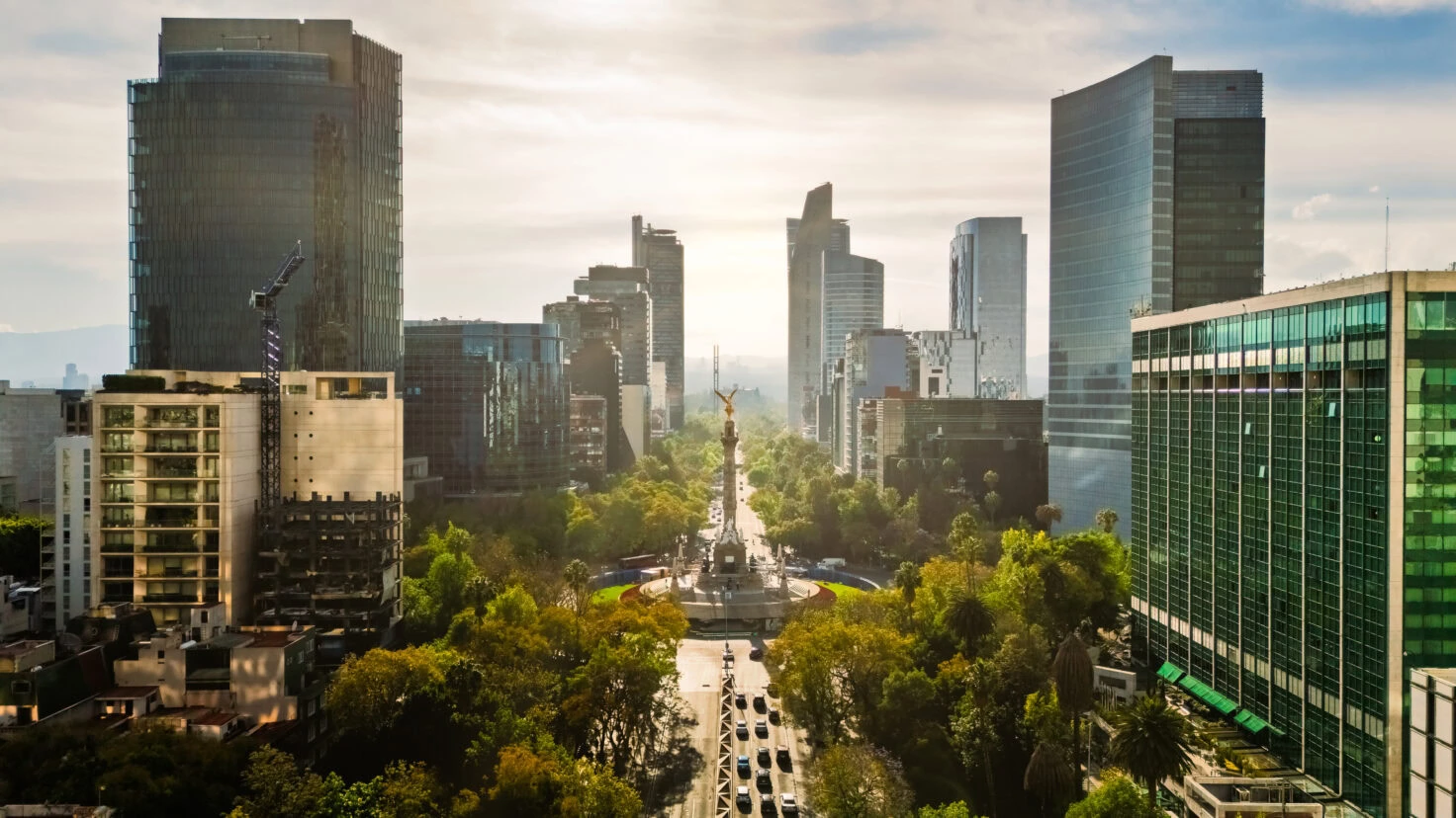 Aerial View Of The Independence Angel In Backlit Sunlight In Mexico City