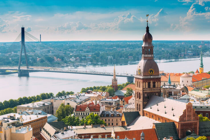 Riga, Latvia. Cityscape In Sunny Summer Day. Famous Landmark Riga Dome Cathedral