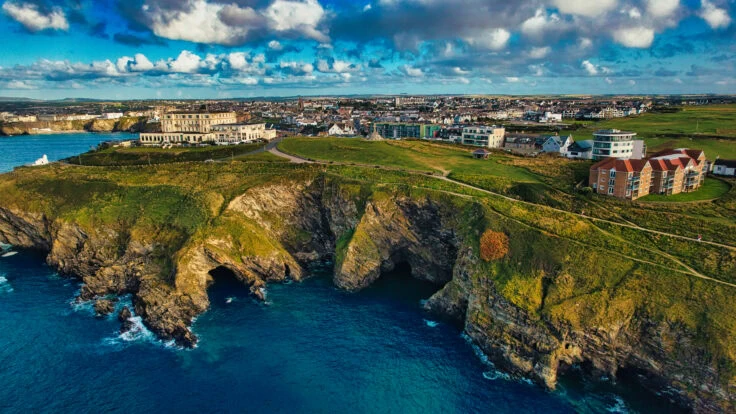 Aerial Coastal View Of A Town With Cliffs And Ocean In Newquay, Cornwall