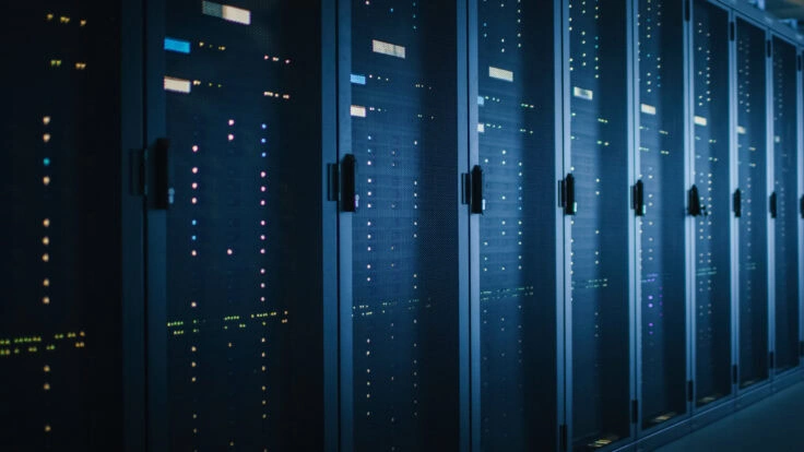 Shot Of Dark Data Center With Multiple Rows Of Fully Operational Server Racks. Modern Telecommunications, Cloud Computing, Artificial Intelligence, Database, Supercomputer. Blue Neon Light.